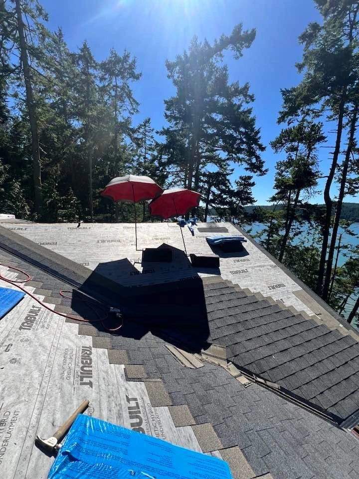 SunSafe Shield shades in use on a roof tear-off and re-roof job